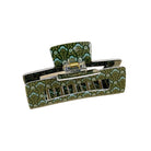 Floral patterned hair clip on a beige background