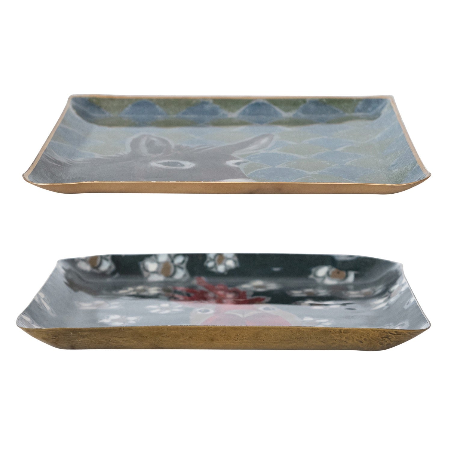Two ceramic trays with artistic designs on a white background