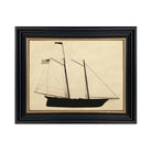Framed artwork of a sailboat on beige paper with a black frame.