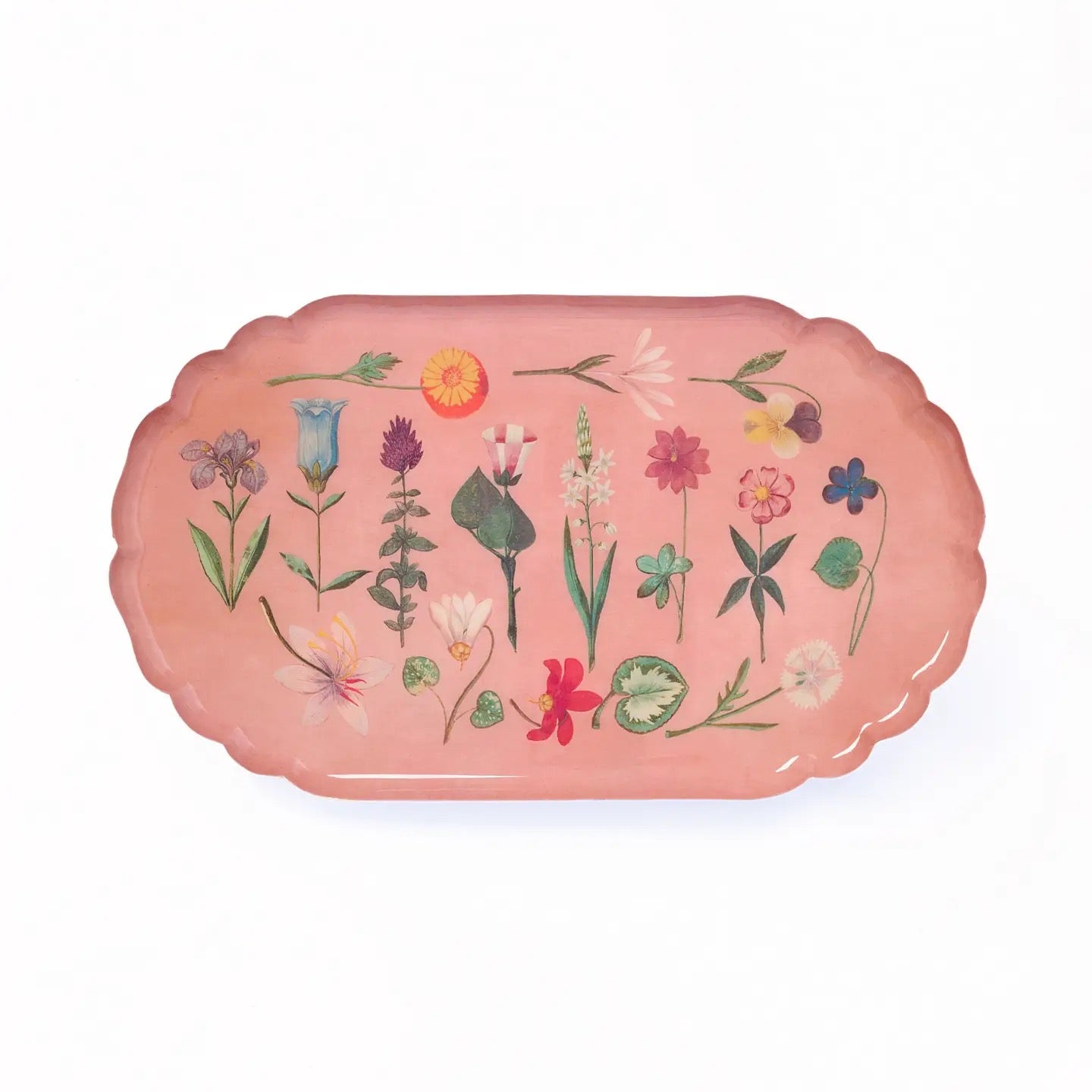 Decorative pink tray with floral designs on a white background