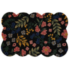 Floral-patterned doormat with pink, blue, and yellow flowers on a black background