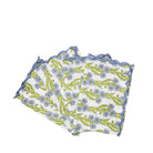 Floral patterned fabric with scalloped edge on a white background