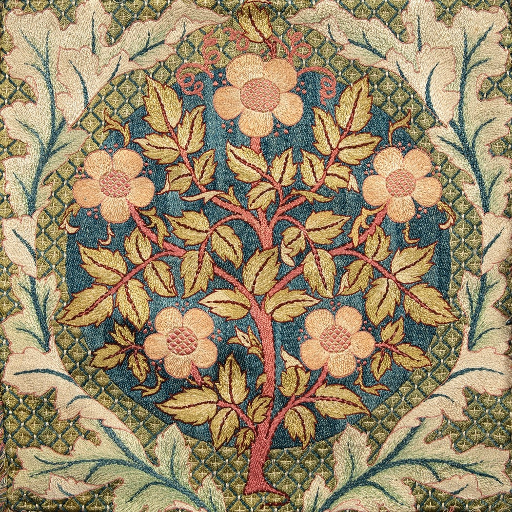 Decorative floral pattern with flowers and leaves on a textured background