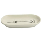 An oval ceramic serving dish in an off-white glaze, featuring a printed silver fork design and the text 'True to Life' on the right side.
