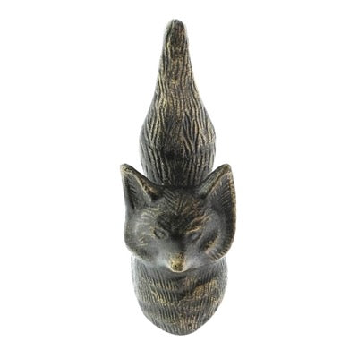 A small carved cat figurine with a textured, weathered finish in dark brown and gray tones, shown against a plain white background.