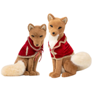 Two plush fox toys wearing red outfits on a white background