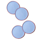 Four round blue coasters with red rims on a white background