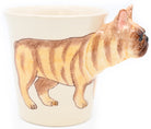 Mug with a design of a brown and white dog on a beige background