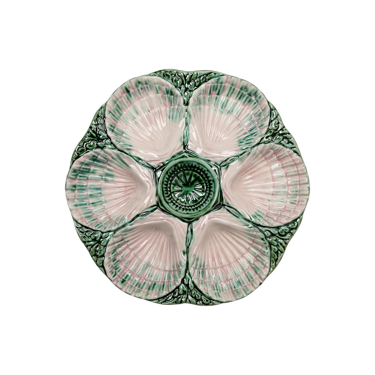 Ceramic oyster plate with shell design on a white background