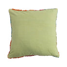Green pillow with colorful trim on a white background