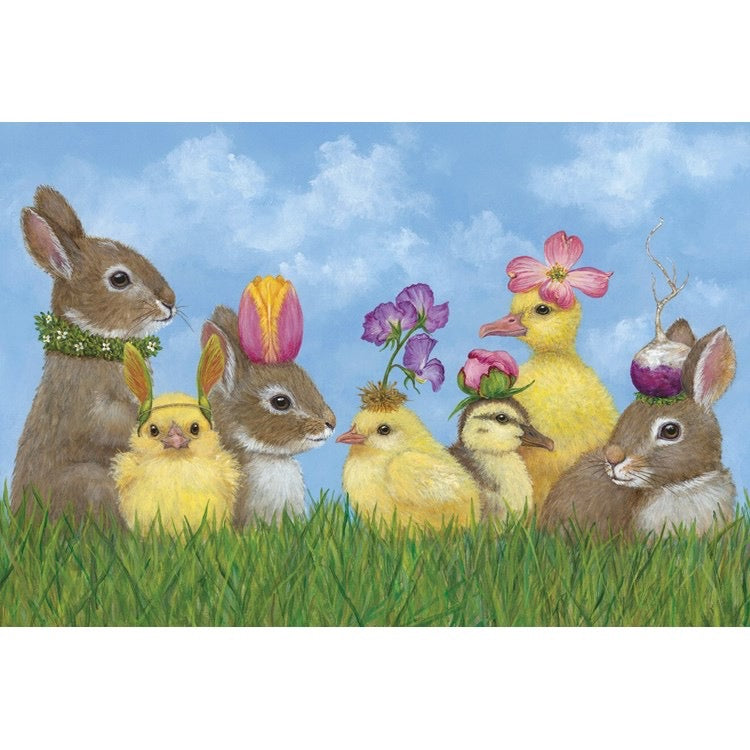 Group of Easter-themed animals with bunnies, chicks, and ducks in a grassy field with a blue sky.