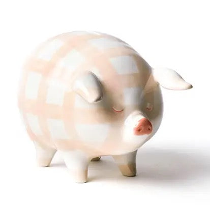 Polka dot piggy bank on a white background