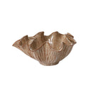 Brown ceramic bowl with wavy edge on a white background
