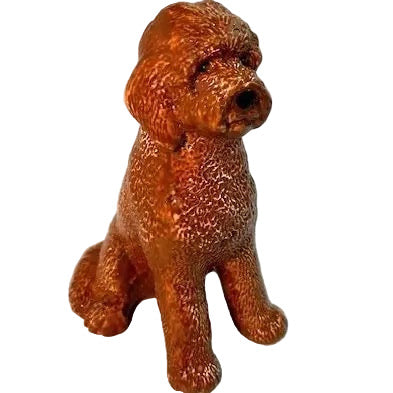 Brown dog figurine on a white background