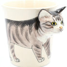 Cat-shaped mug with a detailed illustration of a cat on a white background