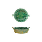 Green ceramic dish with floral patterns on a white background
