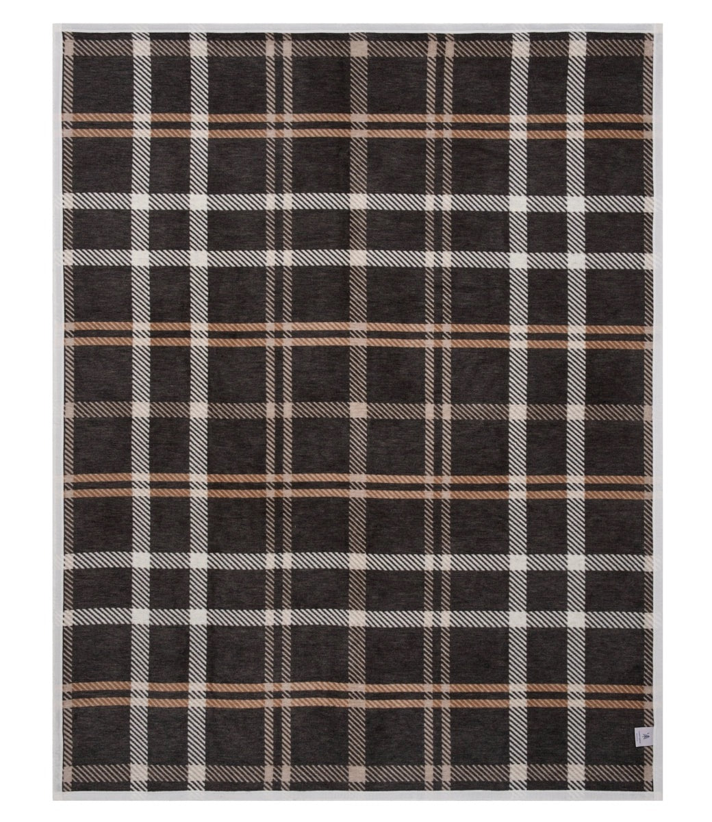 Plaid blanket with black, beige, and white pattern on a white background