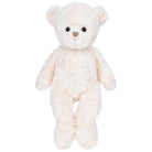 White teddy bear on a white background