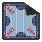 A square gaming mat featuring a blue and light blue striped design with red lobster illustrations and dark blue corner pockets, shown with one corner folded over to reveal a black underside.