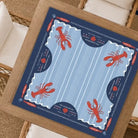 Harbor House Mahjong Mat on a table with chairs and rug