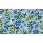Floral pattern with blue flowers and green leaves on a light blue background