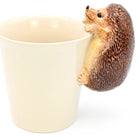 Hedgehog-shaped cup holder on a white background