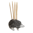Hedgehog-shaped toothpick holder with wooden sticks on a white background