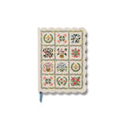 Notebook with floral pattern on a white background