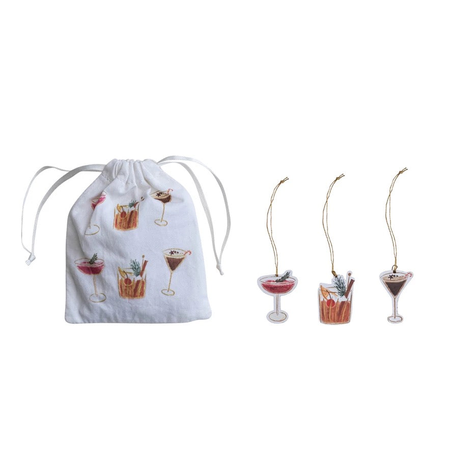 Set of cocktail-themed straws with a drawstring bag on a white background