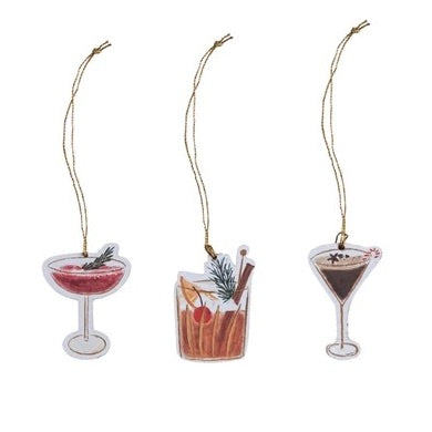 Three cocktail-themed Christmas ornaments on a white background
