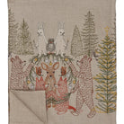 Decorative blanket with embroidered animals and trees on a beige background