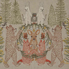 Decorative fabric with embroidered animals in a forest setting