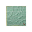 Green checkered fabric square with a brand logo in the corner on a white background