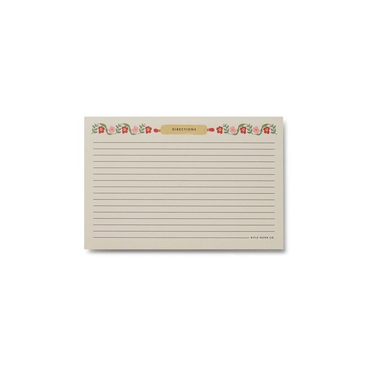 Rectangular notepad with decorative border and text on a white background