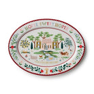 Decorative plate with 'Home Sweet Home' text and a countryside scene on a white background