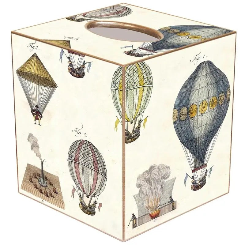 A decorative tissue box cover with a vintage hot air balloon illustration pattern on a cream background, shown on a plain white background.