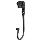 Black metal wall hook with dog head design on a white background