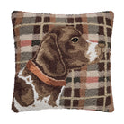 Decorative pillow with a plaid pattern and a dog design on a white background