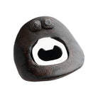 Rustic metal bottle opener on a white background