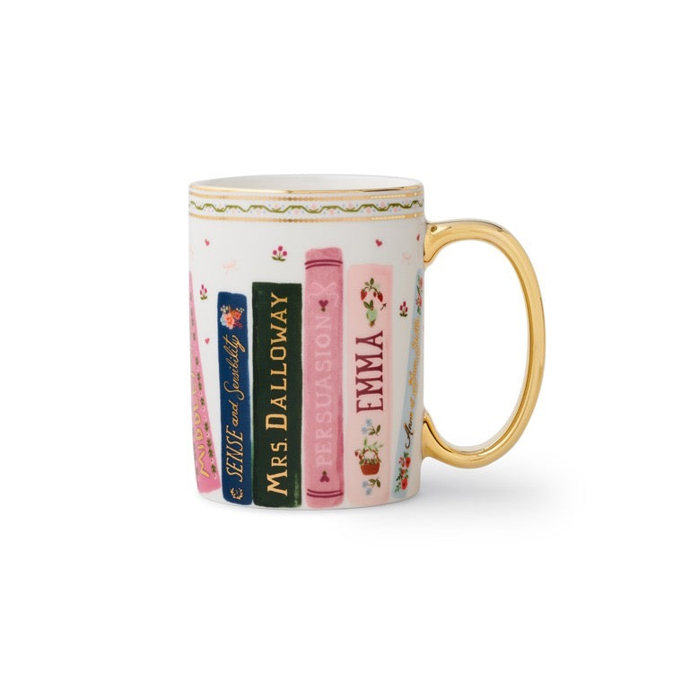 Mug with book design and 'Emma' text on a white background