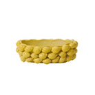 Yellow woven basket on a white background