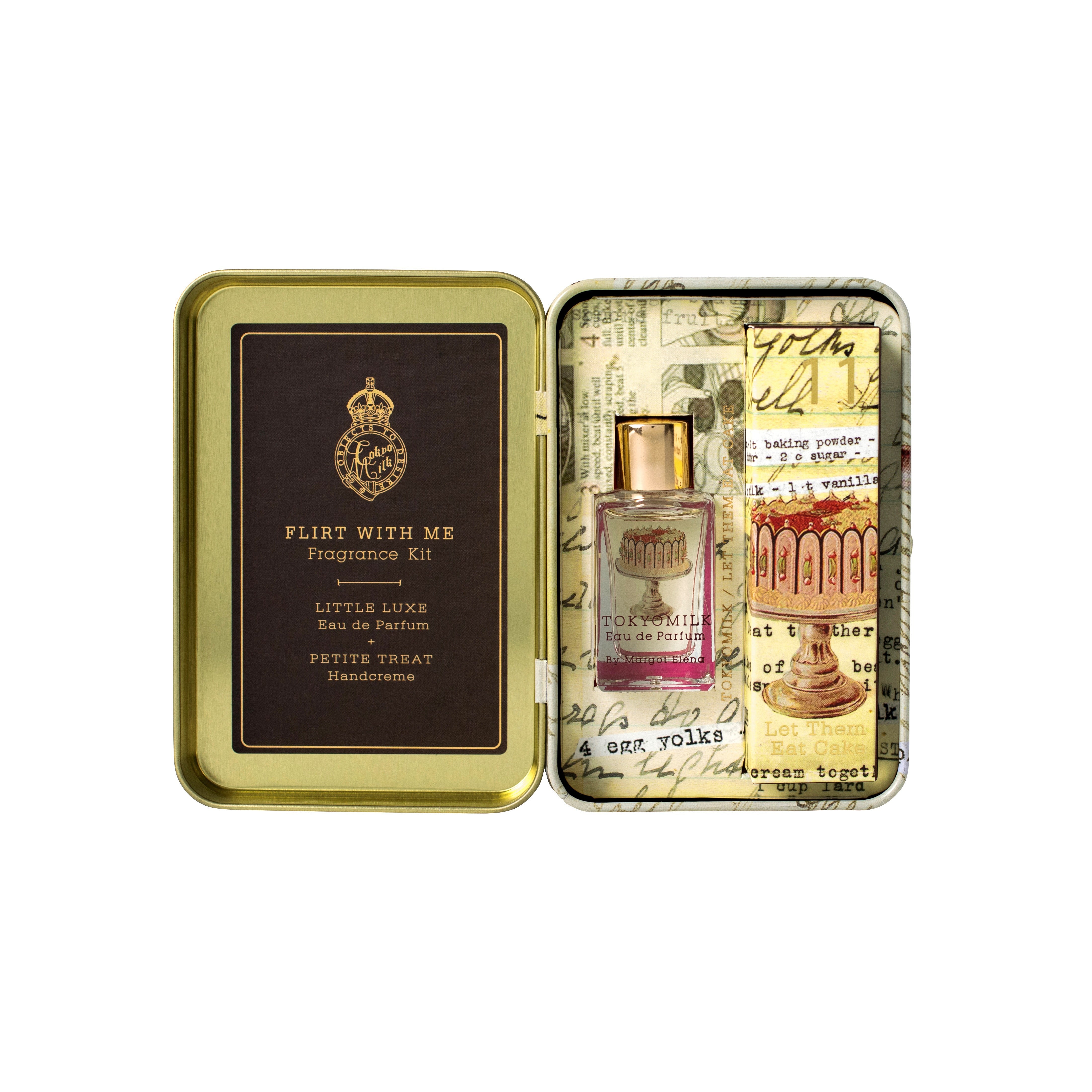 Fragrance kit with a small bottle and packaging on a white background