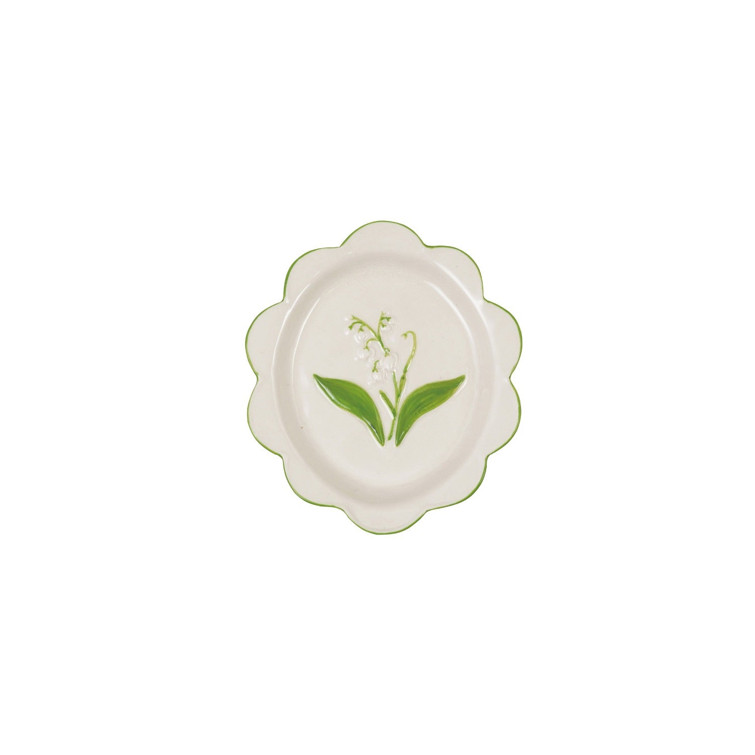 A scalloped ceramic plate in off-white with a green lily of the valley floral design in the center and a thin green scalloped rim, shown against a plain white background.
