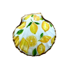 A scallop-shaped decorative tray or dish featuring a hand-painted lemon pattern on a white background with a metallic gold rim.