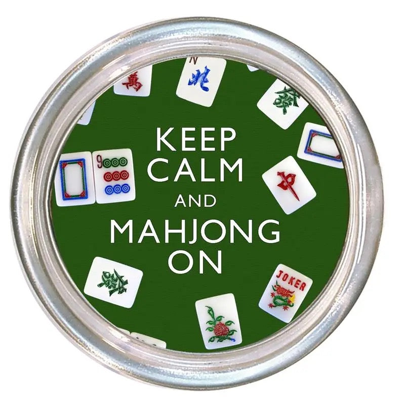 Circular green badge with Mahjong tiles and 'Keep Calm and Mahjong On' text on a white background