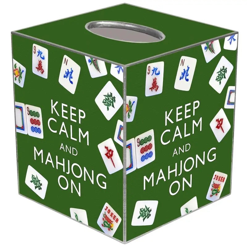 A green Mahjong-themed box with white text reading 'KEEP CALM AND MAHJONG ON' and printed Mahjong tiles around the surface, shown on a white background.