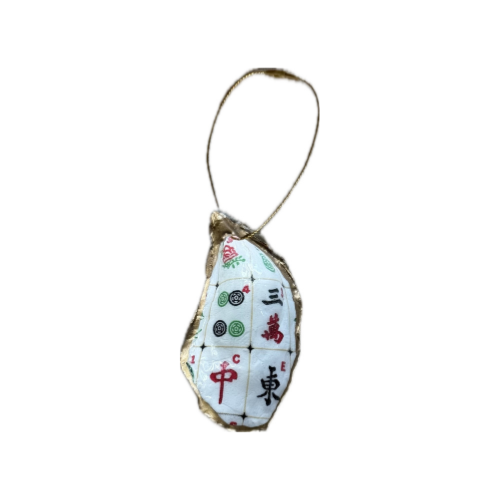 A small fabric ornament shaped like a mahjong tile with a gold-colored border and a hanging loop, shown on a plain white background.
