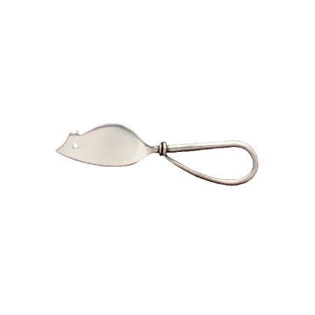 A silver metal cheese knife with a loop handle, shown on a textured red background.