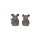 Two gray ceramic mouse figurines on a white background