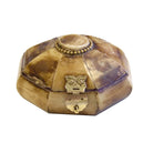 Decorative hexagonal box with gold accents on a white background